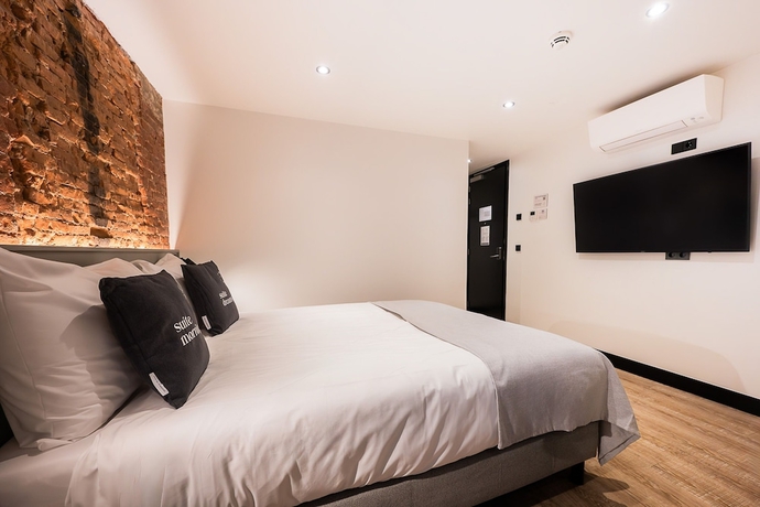 Imagen de la habitación del Hotel limehome Amsterdam Leidsekruisstraat. Foto 6