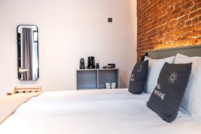Imagen de la habitación del Hotel limehome Amsterdam Leidsekruisstraat. Foto 8