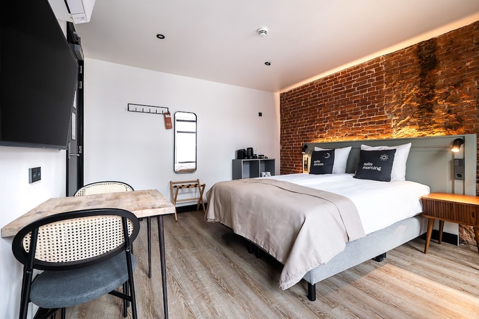 Imagen de la habitación del Hotel limehome Amsterdam Leidsekruisstraat. Foto 11