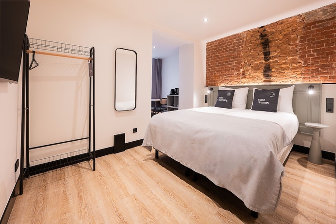 Imagen de la habitación del Hotel limehome Amsterdam Leidsekruisstraat. Foto 12