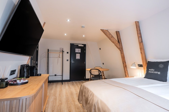 Imagen de la habitación del Hotel limehome Amsterdam Leidsekruisstraat. Foto 14