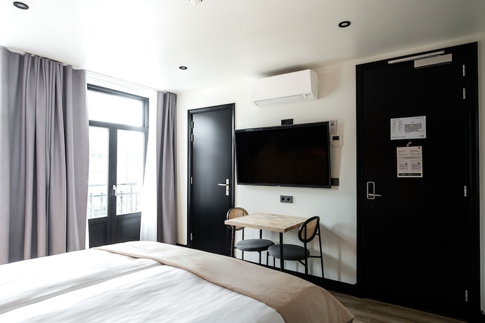 Imagen de la habitación del Hotel limehome Amsterdam Leidsekruisstraat. Foto 15