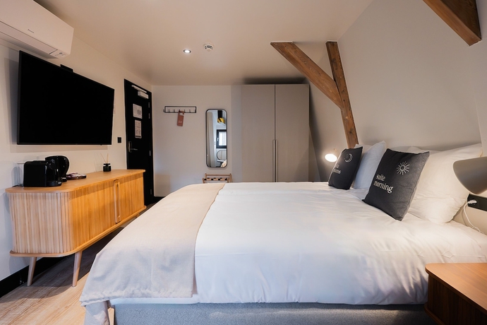 Imagen de la habitación del Hotel limehome Amsterdam Leidsekruisstraat. Foto 17