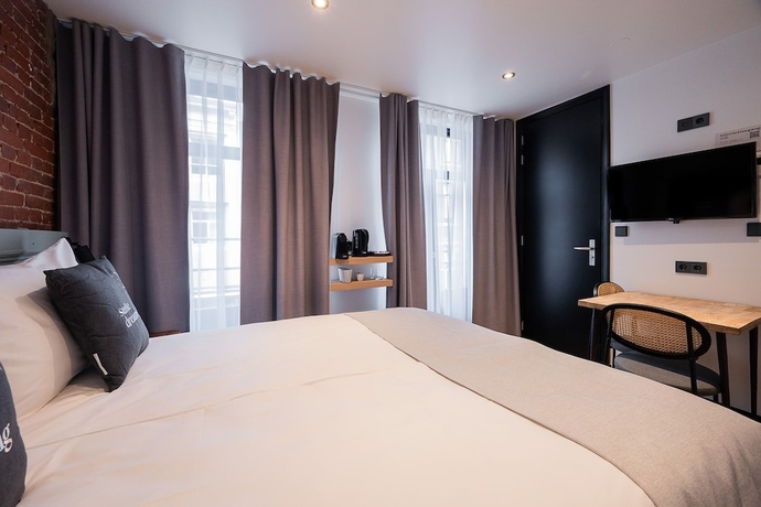 Imagen de la habitación del Hotel limehome Amsterdam Leidsekruisstraat. Foto 18