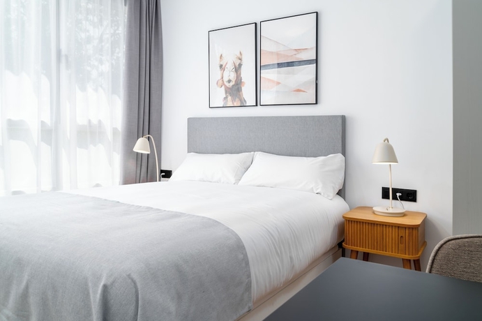 Imagen de la habitación del Hotel limehome Valencia Carrer d'Antonio Ferrandis. Foto 16