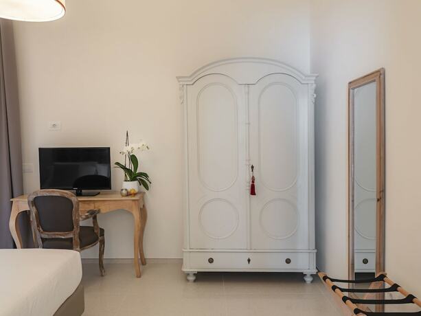 Imagen de la habitación del Hotel living u HomeSuites. Foto 11