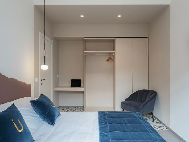 Imagen de la habitación del Hotel living u HomeSuites. Foto 16