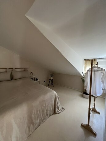 Imagen de la habitación del Hotel loor luxury retreat. Foto 16
