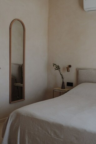 Imagen de la habitación del Hotel loor luxury retreat. Foto 20