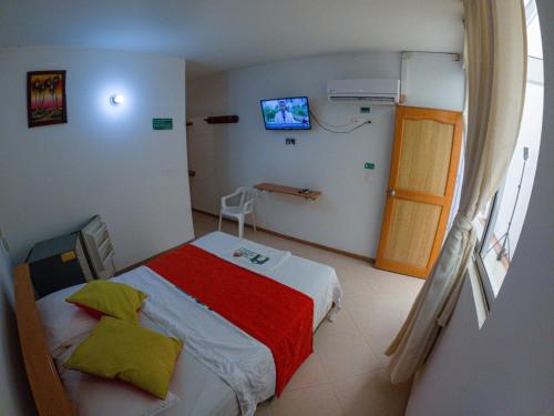 Imagen de la habitación del Hotel los leones Melgar. Foto 18