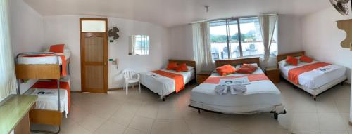 Imagen de la habitación del Hotel los leones Melgar. Foto 19