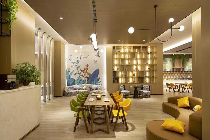 Imagen del bar/restaurante del Hotel mango crystal hotel. Foto 7