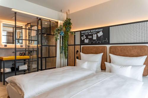 Imagen de la habitación del Hotel me and all Ulm. Foto 19