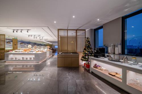 Imagen de la habitación del Hotel mei豪丽致酒店南宁东站店. Foto 19