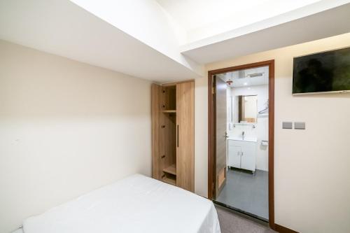 Imagen de la habitación del Hotel metacity living. Foto 18