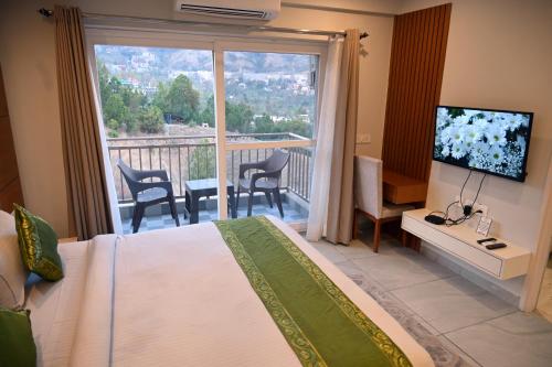 Imagen de la habitación del Hotel mountain crest. Foto 8