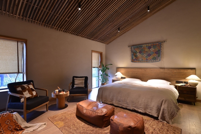 Imagen de la habitación del Hotel naked Hill. Foto 16