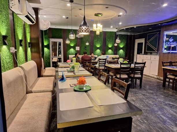 Imagen del bar/restaurante del Hotel nancy paradise hotel. Foto 4