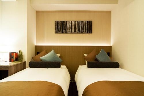 Imagen de la habitación del Hotel nippombashi crystal hotel Ⅱ. Foto 7