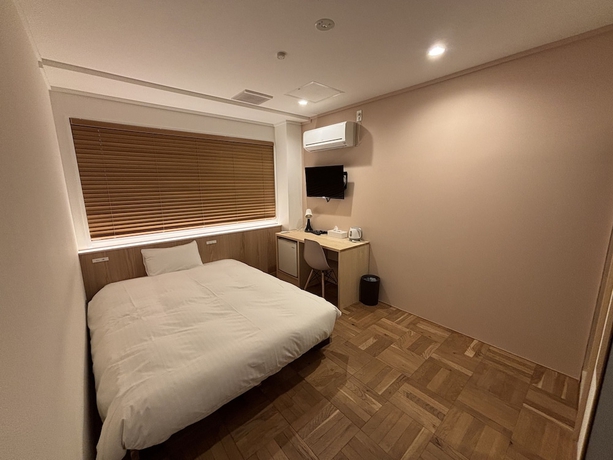 Imagen de la habitación del Hotel nirasakiyaSTAY. Foto 10