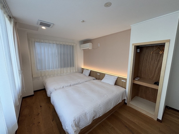 Imagen de la habitación del Hotel nirasakiyaSTAY. Foto 11