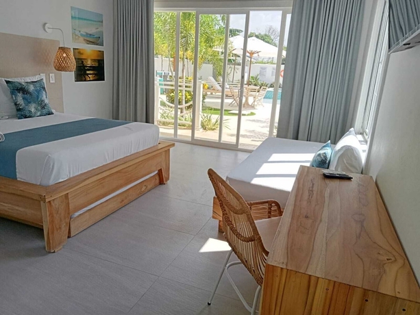 Imagen de la habitación del Hotel oasis tolu boutique. Foto 2