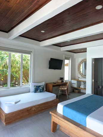 Imagen de la habitación del Hotel oasis tolu boutique. Foto 3