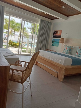 Imagen de la habitación del Hotel oasis tolu boutique. Foto 6