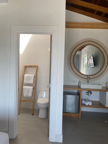 Imagen de la habitación del Hotel oasis tolu boutique. Foto 11
