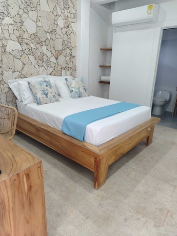 Imagen de la habitación del Hotel oasis tolu boutique. Foto 12