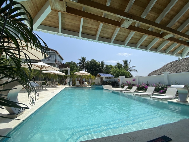Imagen de la piscina del Hotel oasis tolu boutique. Foto 16