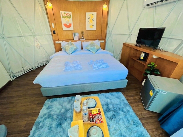 Imagen de la habitación del Hotel papa q suite resorts. Foto 7