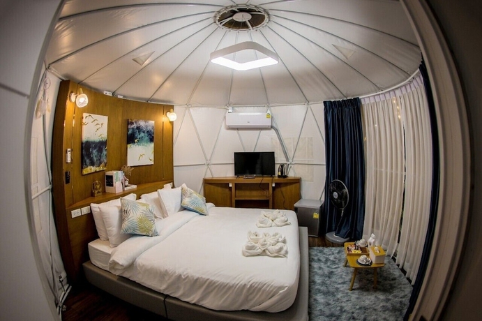 Imagen de la habitación del Hotel papa q suite resorts. Foto 8