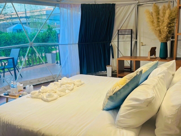 Imagen de la habitación del Hotel papa q suite resorts. Foto 9