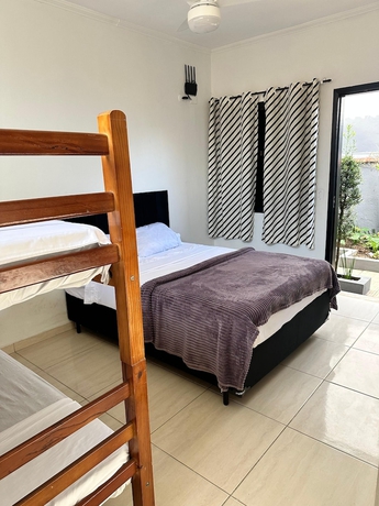 Imagen de la habitación del Hotel pousada ohana, Bertioga. Foto 1