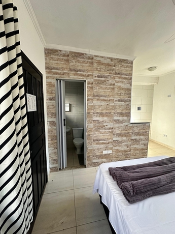 Imagen de la habitación del Hotel pousada ohana, Bertioga. Foto 7