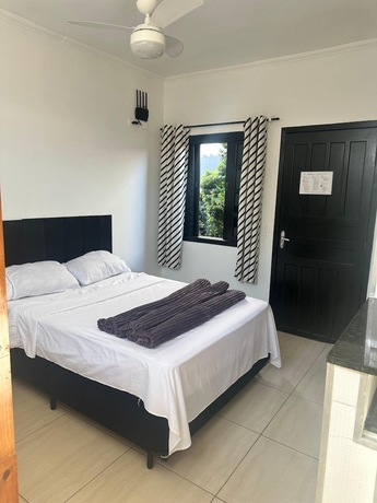 Imagen de la habitación del Hotel pousada ohana, Bertioga. Foto 13