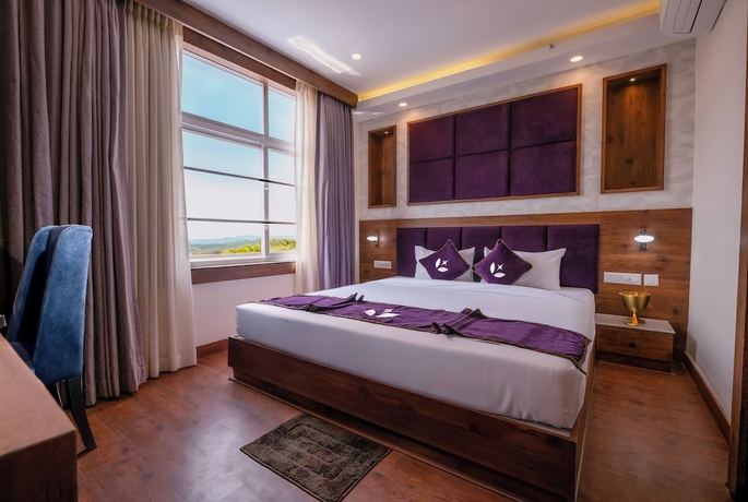 Imagen de la habitación del Hotel purple leaf. Foto 2