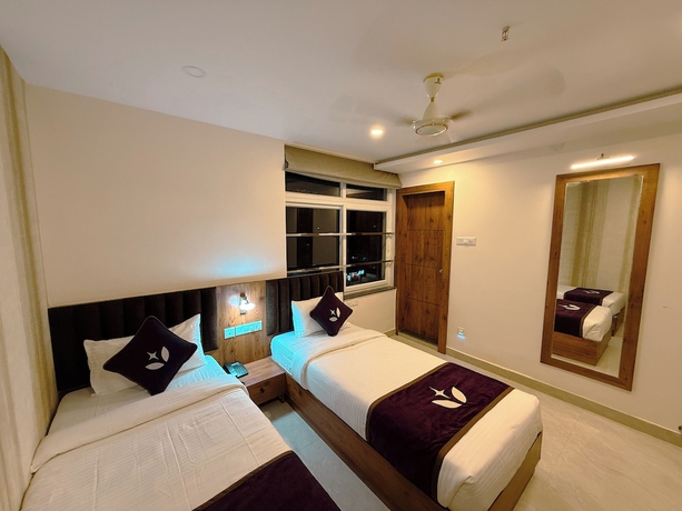 Imagen de la habitación del Hotel purple leaf. Foto 6