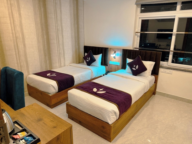 Imagen de la habitación del Hotel purple leaf. Foto 7