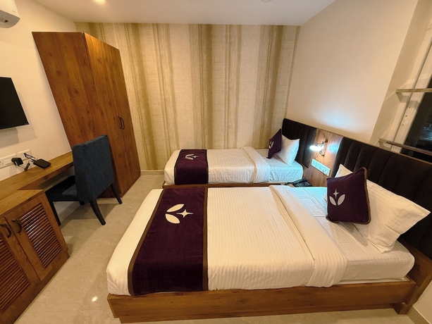 Imagen de la habitación del Hotel purple leaf. Foto 11