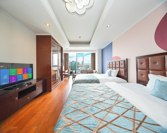 Imagen de la habitación del Hotel qingdaowanxianghaijing. Foto 2