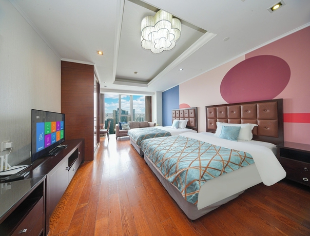 Imagen de la habitación del Hotel qingdaowanxianghaijing. Foto 3