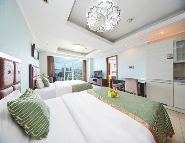 Imagen de la habitación del Hotel qingdaowanxianghaijing. Foto 7