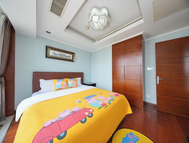 Imagen de la habitación del Hotel qingdaowanxianghaijing. Foto 8