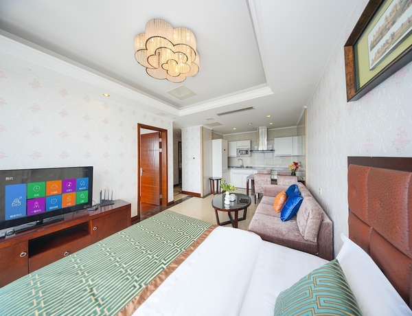 Imagen de la habitación del Hotel qingdaowanxianghaijing. Foto 9