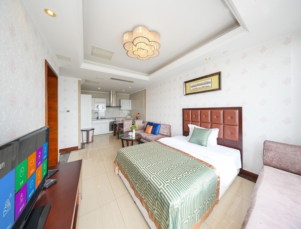Imagen de la habitación del Hotel qingdaowanxianghaijing. Foto 10