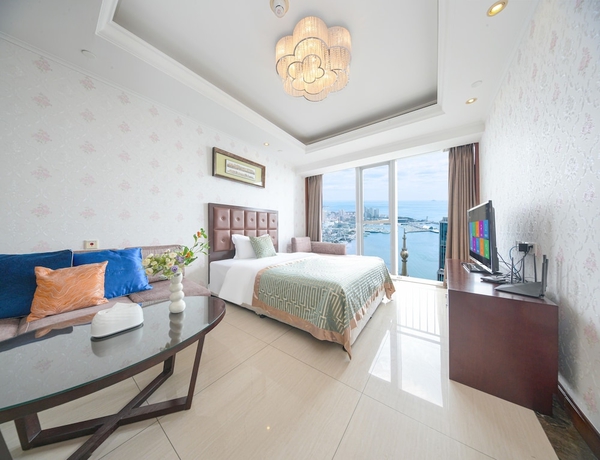 Imagen de la habitación del Hotel qingdaowanxianghaijing. Foto 11