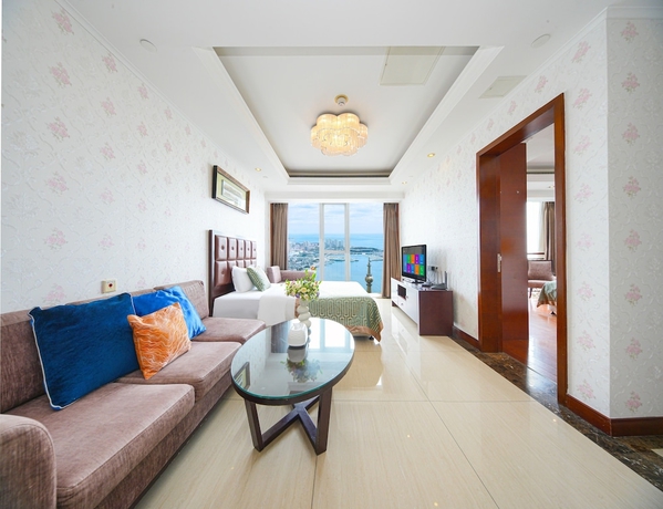 Imagen de la habitación del Hotel qingdaowanxianghaijing. Foto 12