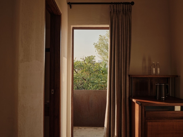 Imagen de la habitación del Hotel qingyuansanhedaoli. Foto 7